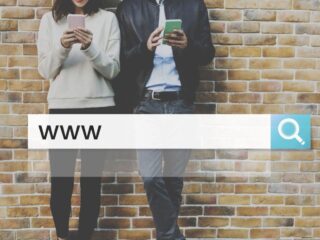A search bar graphic over two people, indicating that they're navigating to the best people finder website.